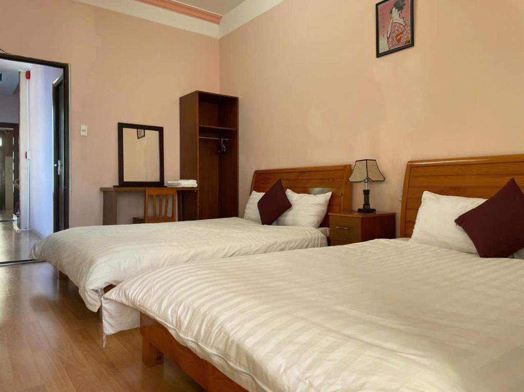 Ліжко або ліжка в номері New Sleep in Dalat Hostel