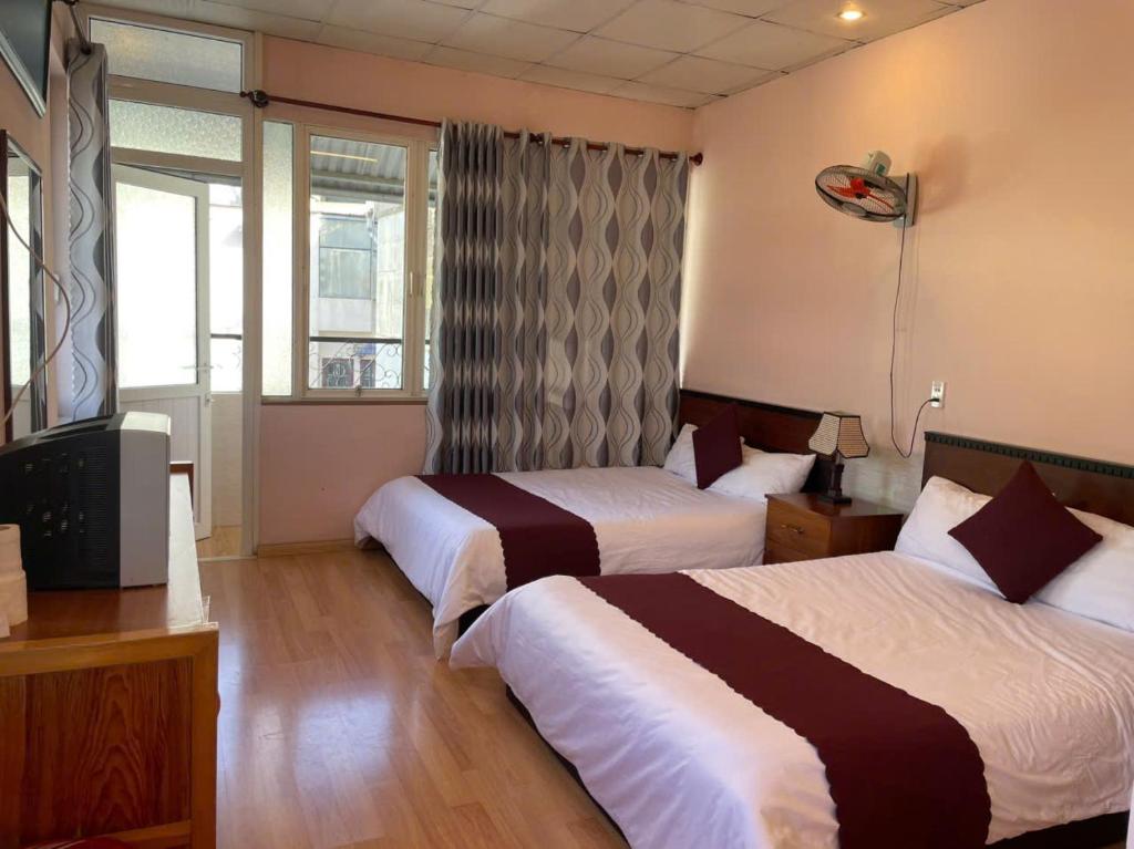 Ліжко або ліжка в номері New Sleep in Dalat Hostel