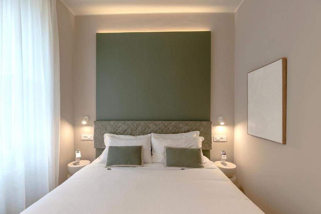 Postel nebo postele na pokoji v ubytování Aiello Hotels - Isola Design District
