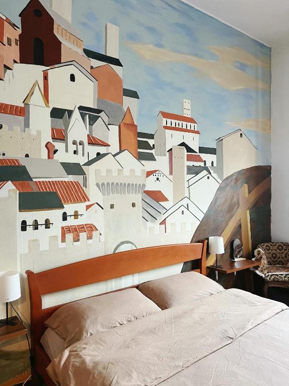 Postel nebo postele na pokoji v ubytování Muse Inn