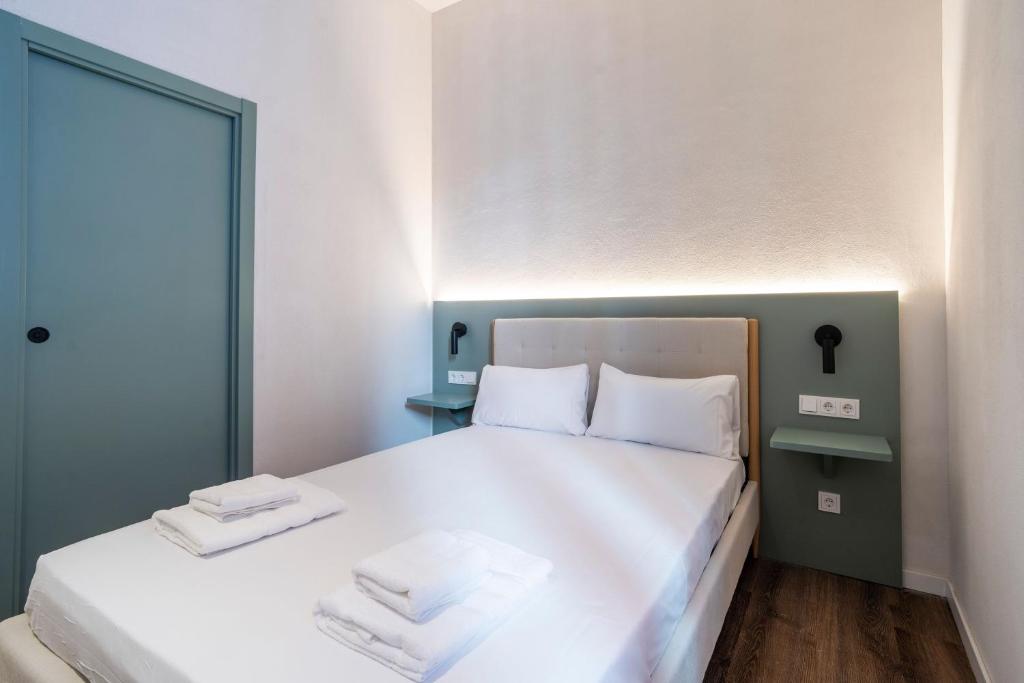 Postel nebo postele na pokoji v ubytování VLC HOST - Reina 168