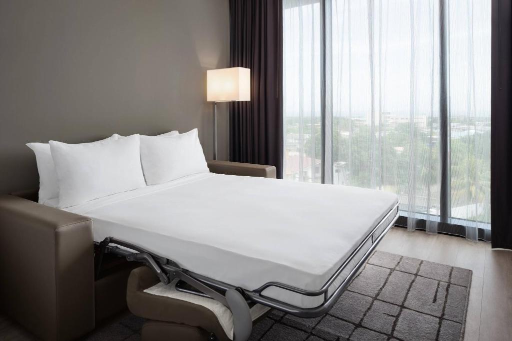 Postel nebo postele na pokoji v ubytování AC Hotel by Marriott Kingston, Jamaica