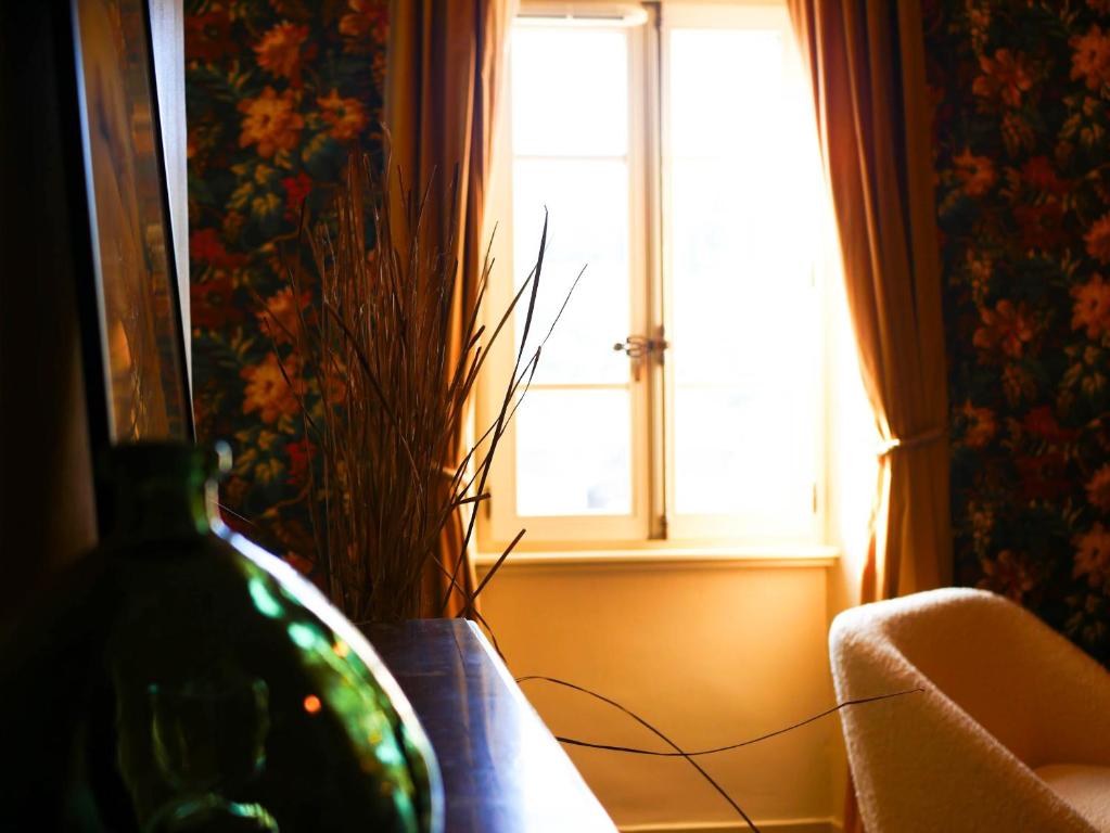 Posezení v ubytování Maison d'hôtes - Stay and Cook