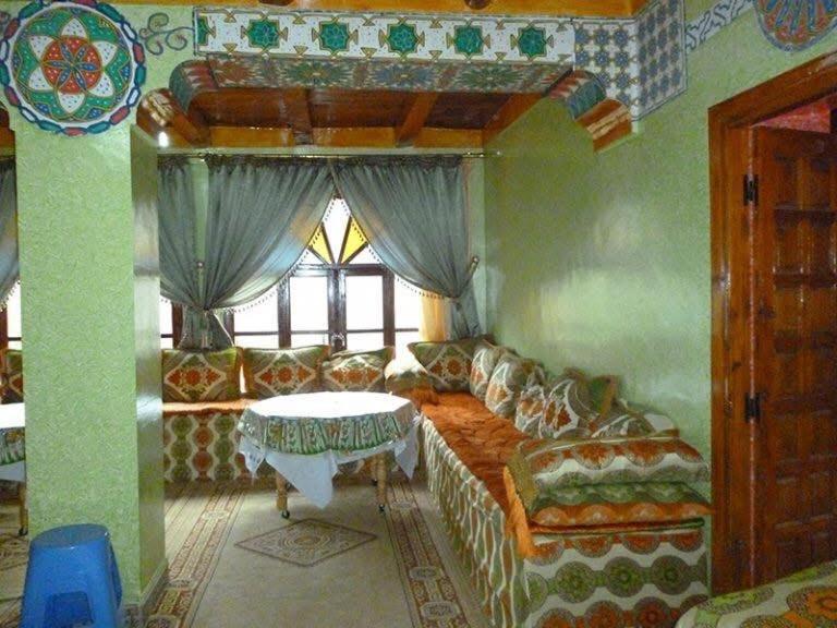 Un pat sau paturi într-o cameră la Gite D'etape Ait Ali Nito Assounfou