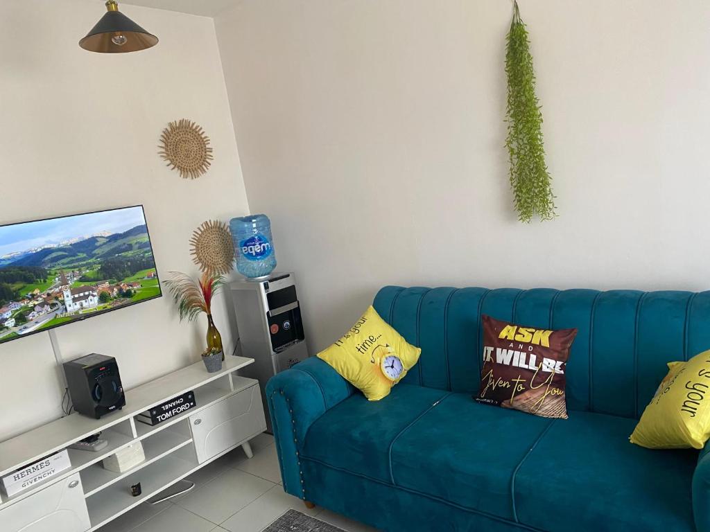 TV a/nebo společenská místnost v ubytování Ample home