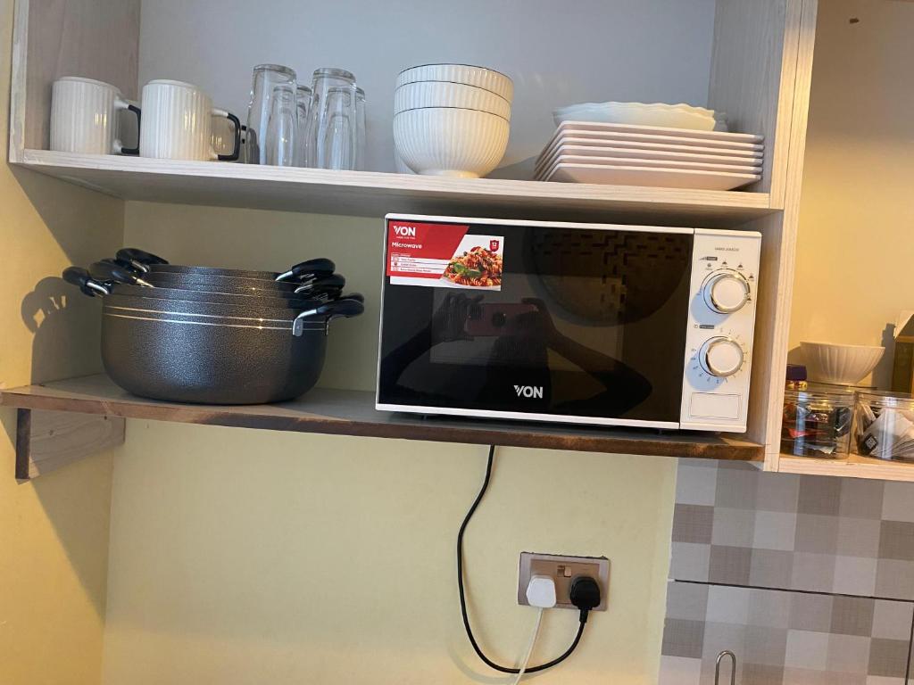 Kuchyň nebo kuchyňský kout v ubytování Ample home