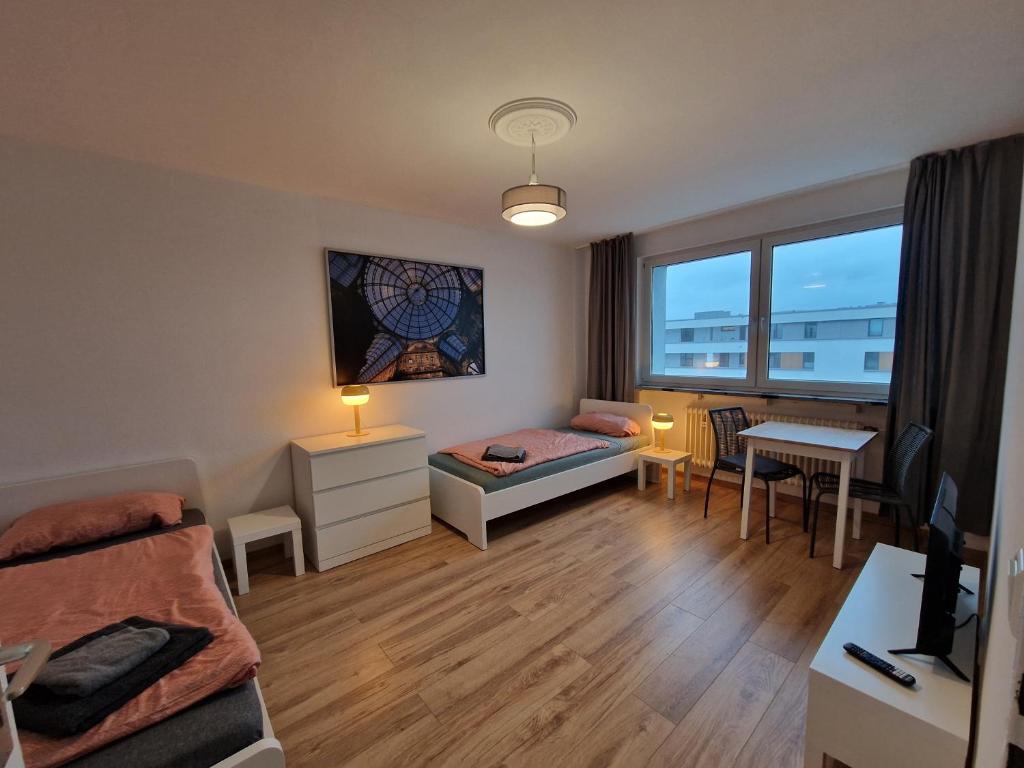 Ліжко або ліжка в номері Hafenblick Apartment - Central
