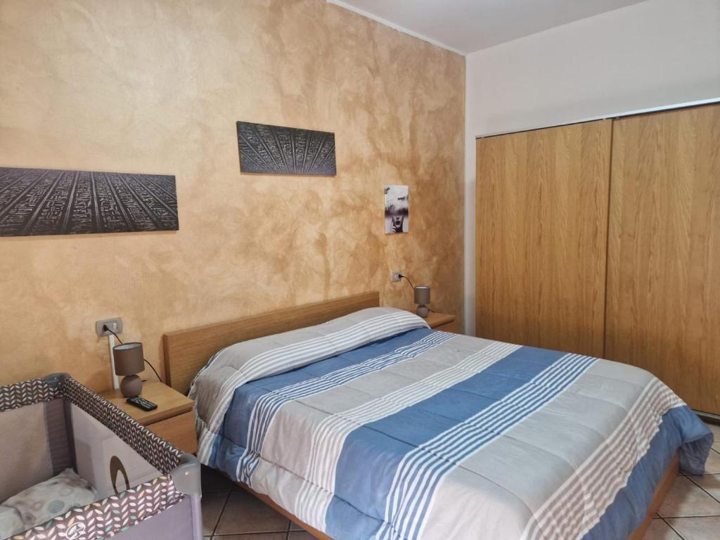 Un pat sau paturi într-o cameră la Elisa Adda House