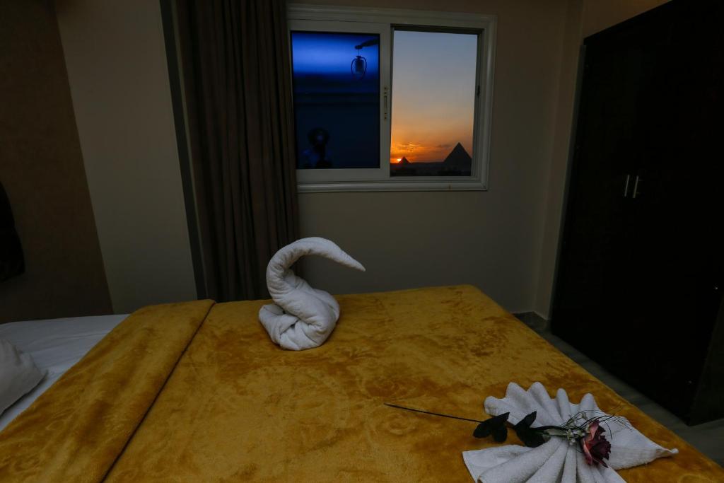 Postel nebo postele na pokoji v ubytování sun view inn