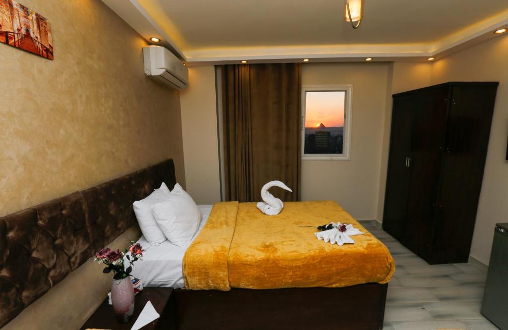 Postel nebo postele na pokoji v ubytování sun view inn