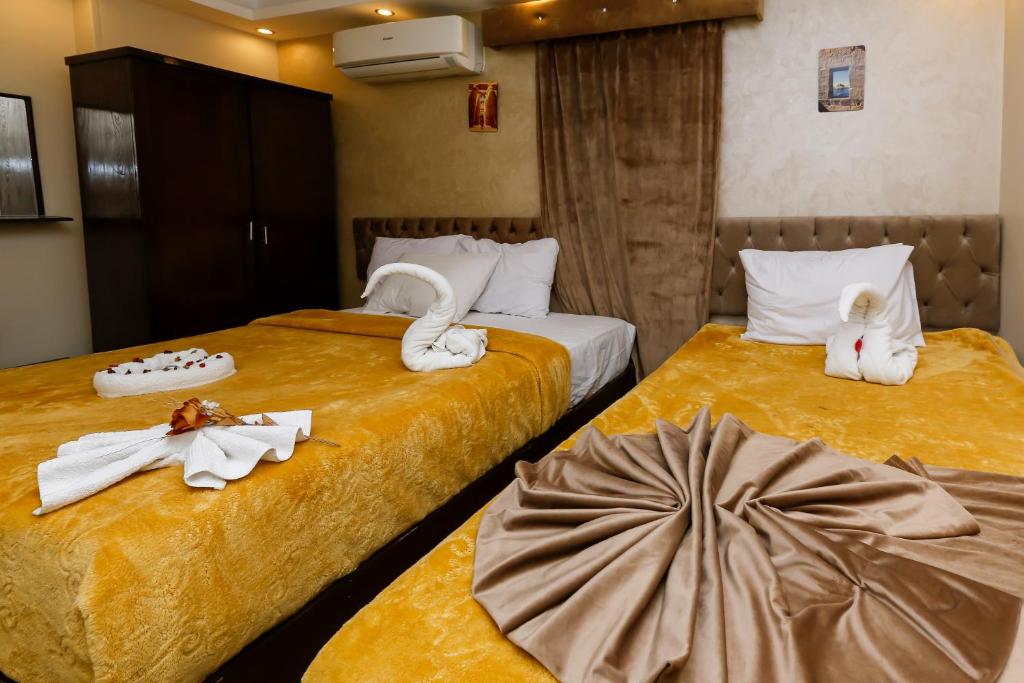 Postel nebo postele na pokoji v ubytování sun view inn
