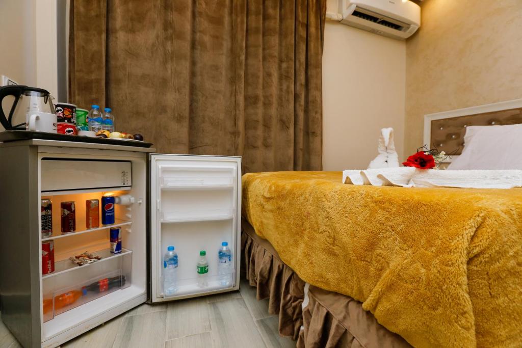 Postel nebo postele na pokoji v ubytování sun view inn