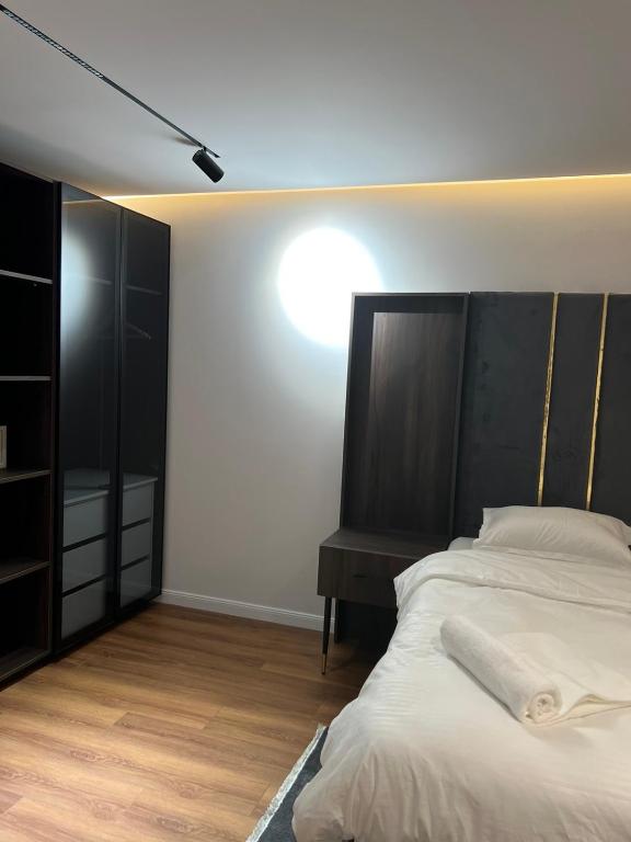 Postel nebo postele na pokoji v ubytování Hotel Europa Prishtina
