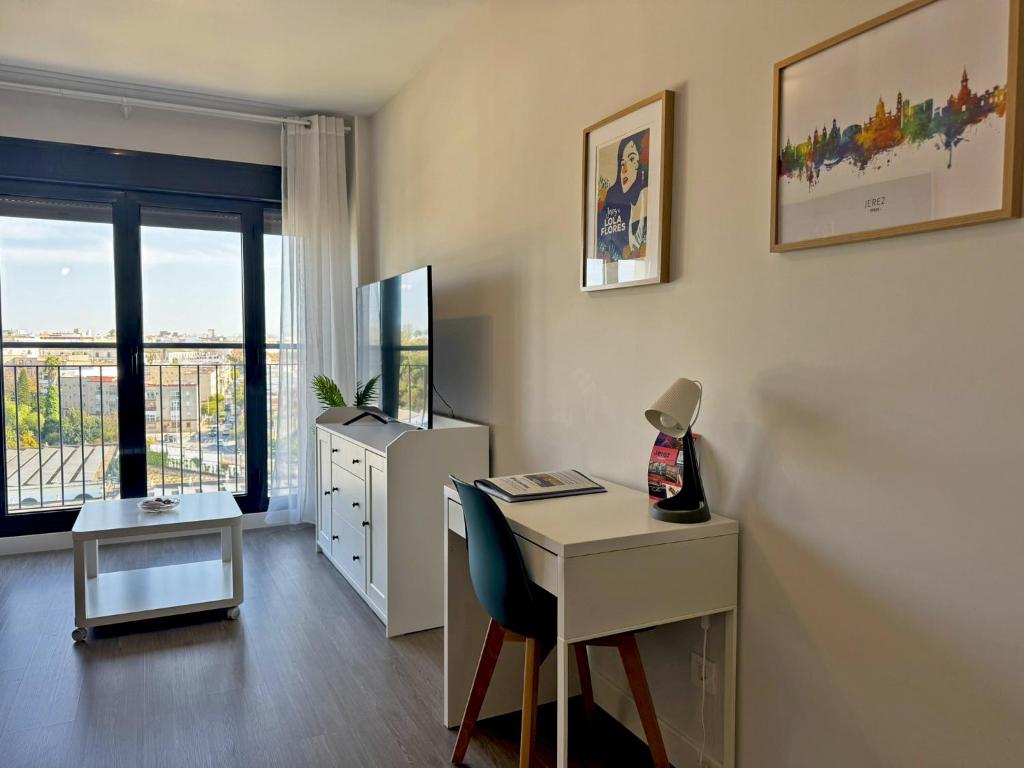 Telewizja i/lub zestaw kina domowego w obiekcie Apartamento Alazán - Ole Solutions