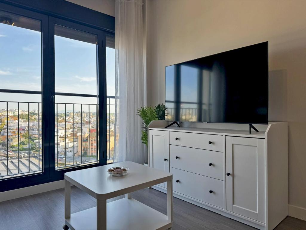 Telewizja i/lub zestaw kina domowego w obiekcie Apartamento Alazán - Ole Solutions