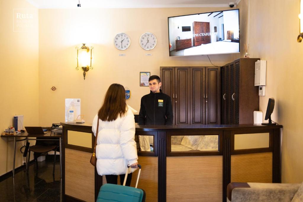 Členové personálu v ubytování Ruta Resort Polyana