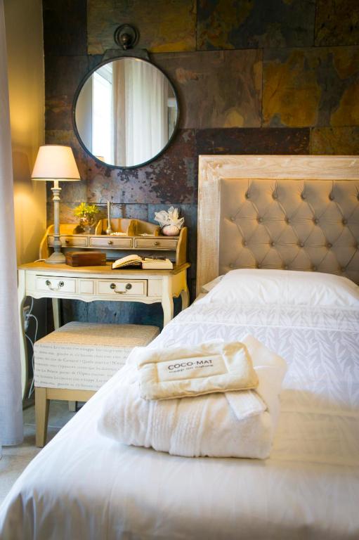 Postel nebo postele na pokoji v ubytování Villa Teresa Luxury Suites