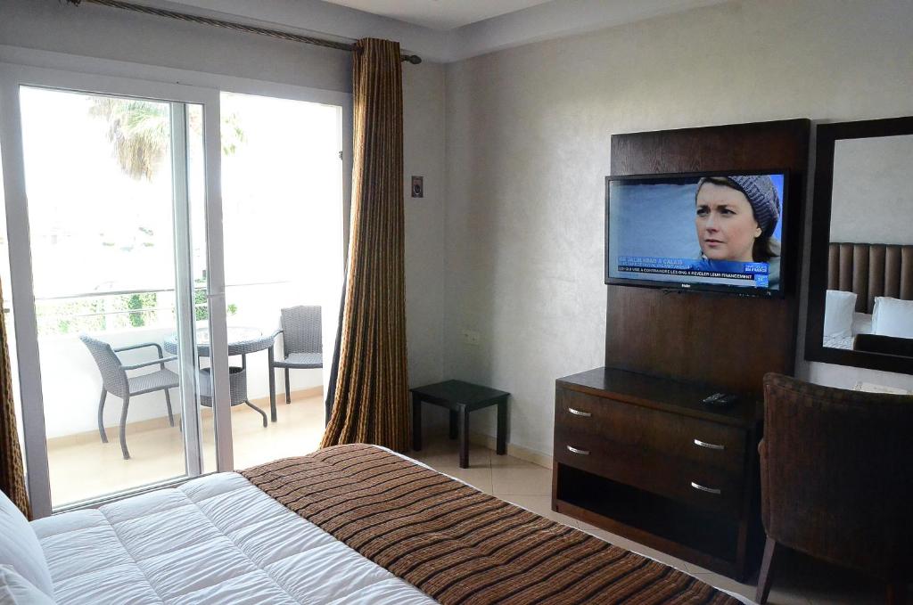 TV a/nebo společenská místnost v ubytování Hotel Chams