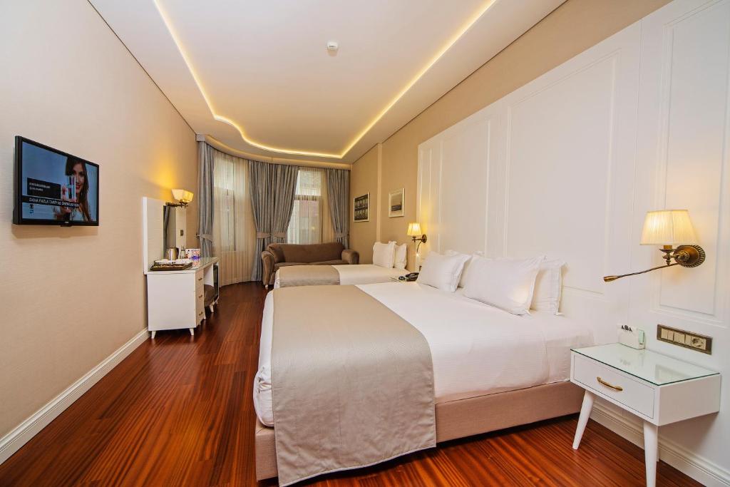 Postel nebo postele na pokoji v ubytování Ada Karakoy Hotel - Special Category