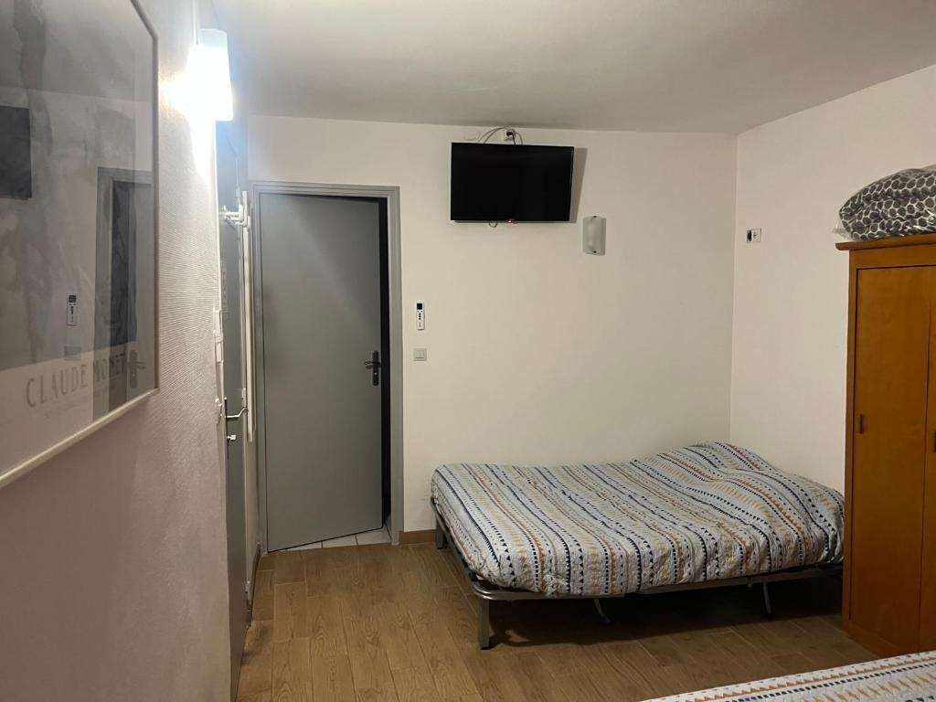 Postel nebo postele na pokoji v ubytování Le Terminus Laroche Migennes Gare