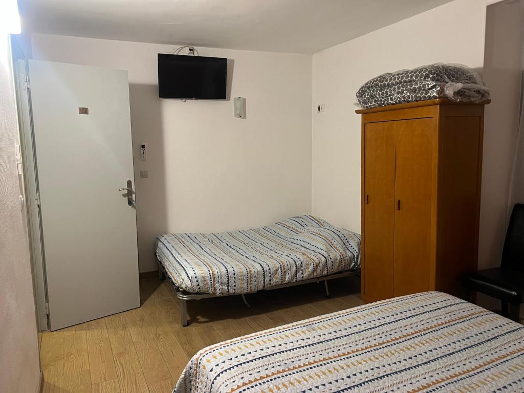 Postel nebo postele na pokoji v ubytování Le Terminus Laroche Migennes Gare