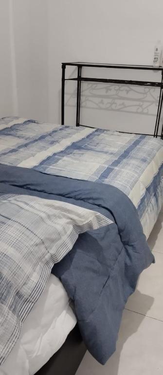 Letto o letti in una camera di HOSTAL CARACOLI - HUECO