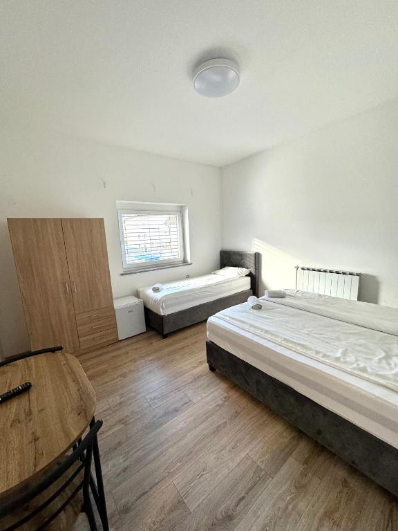 Postel nebo postele na pokoji v ubytování L&L rooms