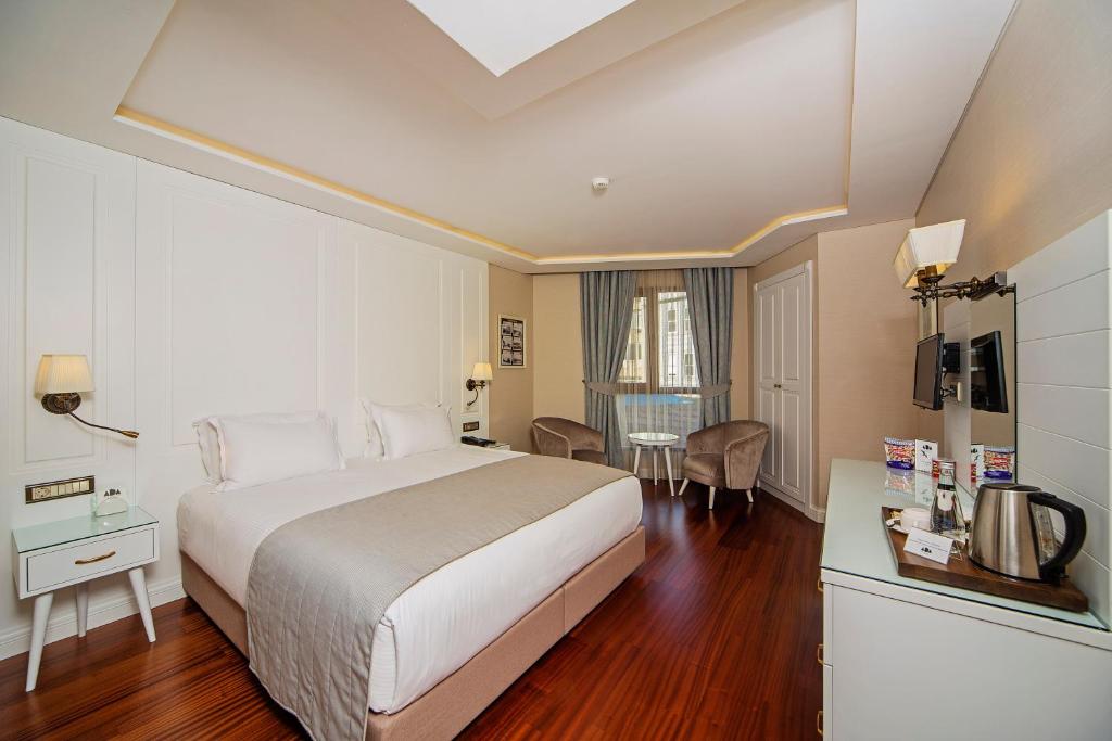 Postel nebo postele na pokoji v ubytování Ada Karakoy Hotel - Special Category