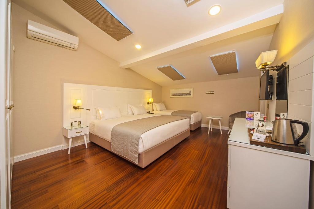 Postel nebo postele na pokoji v ubytování Ada Karakoy Hotel - Special Category