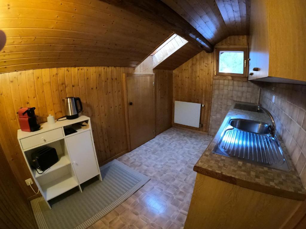 Kuchyň nebo kuchyňský kout v ubytování Panorama Apartment