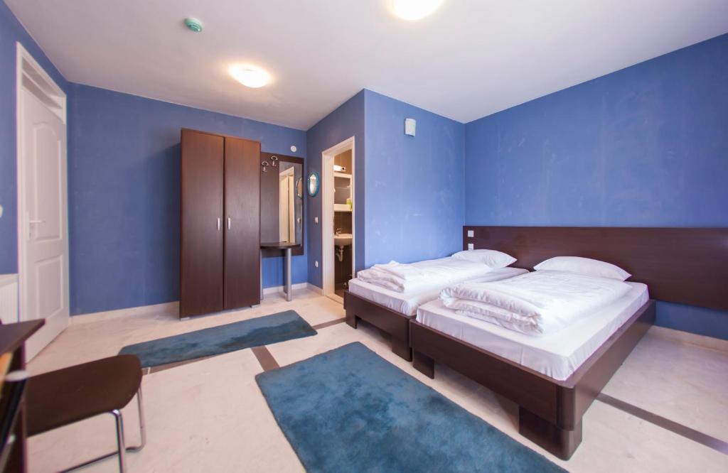 Postel nebo postele na pokoji v ubytování Hotel Hayat Hills