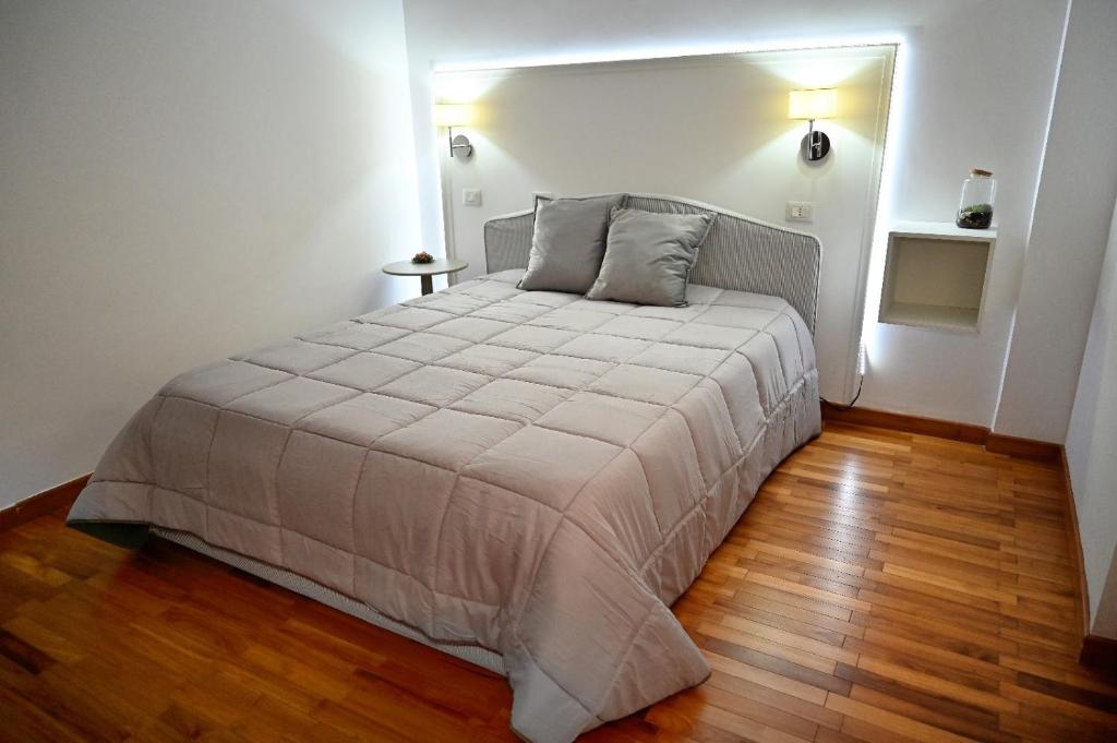 Postel nebo postele na pokoji v ubytování B&B MareLuna