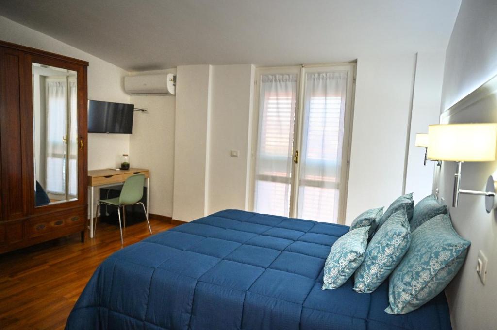 Postel nebo postele na pokoji v ubytování B&B MareLuna