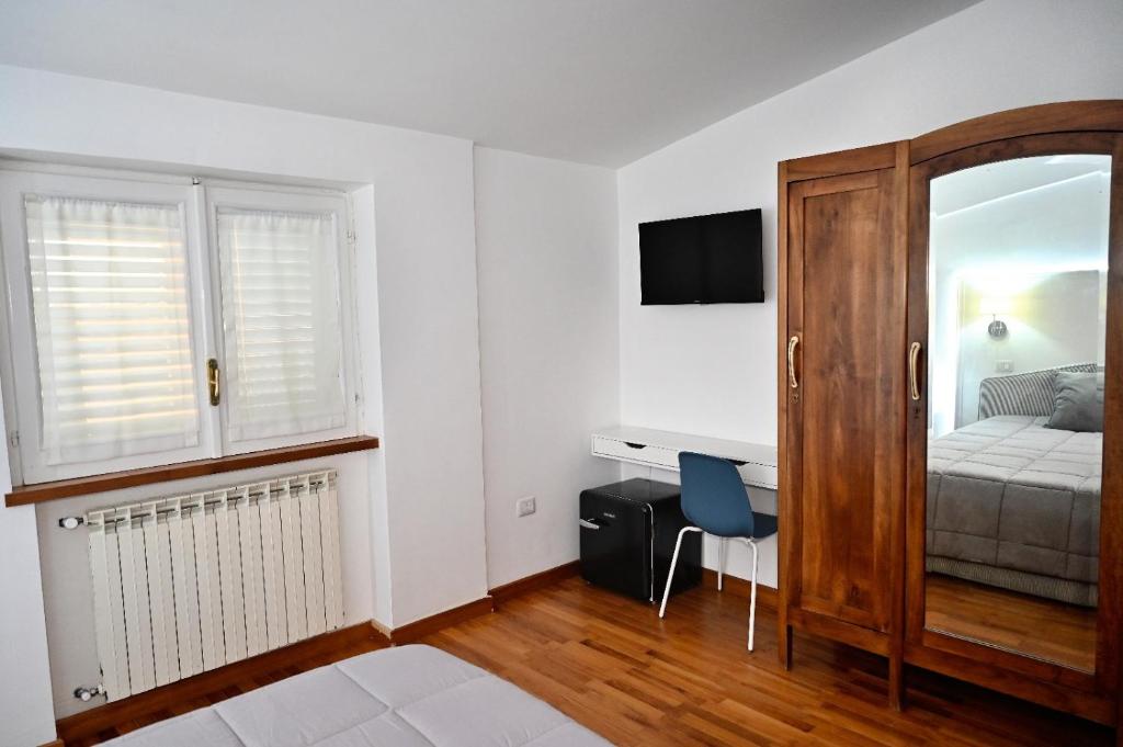 Postel nebo postele na pokoji v ubytování B&B MareLuna