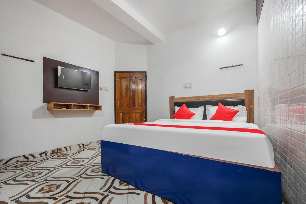 Postel nebo postele na pokoji v ubytování Hotel O ARES RESIDENCY
