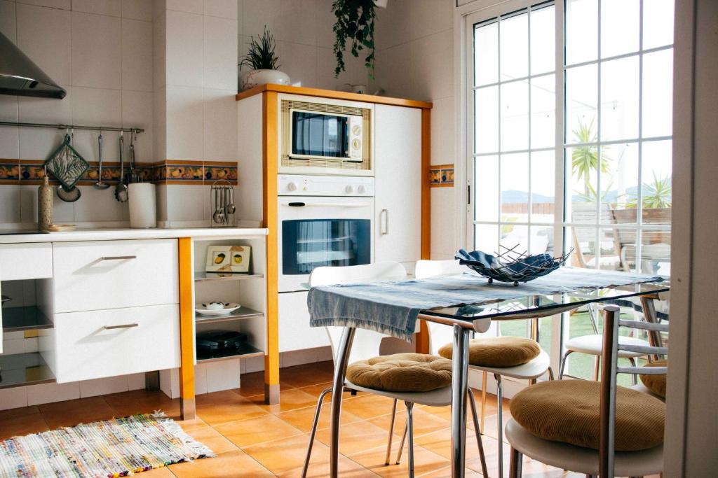 Kuchyň nebo kuchyňský kout v ubytování Apartamento Atico-Spa