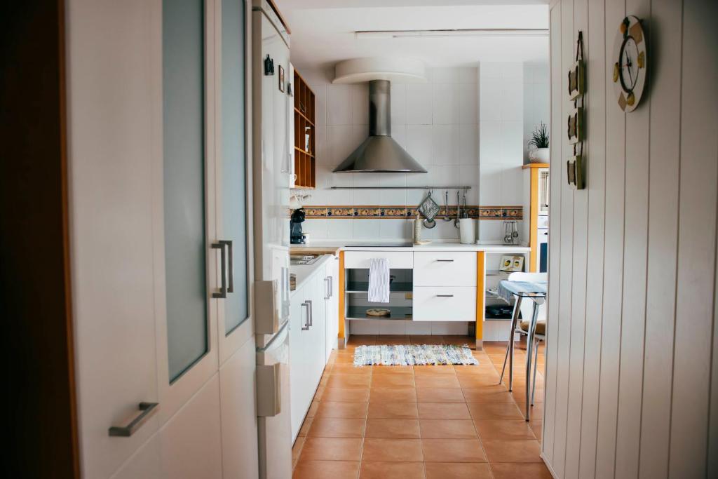 Kuchyň nebo kuchyňský kout v ubytování Apartamento Atico-Spa
