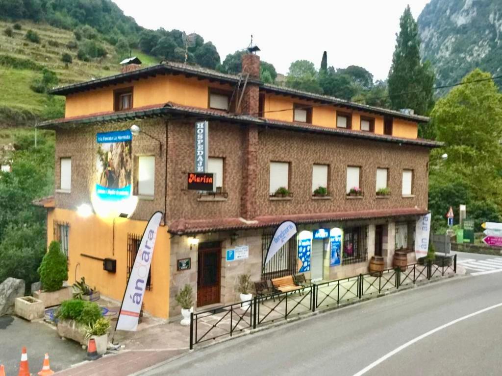 a building on the side of a road at HOSPEDAJE MARISA in La Hermida