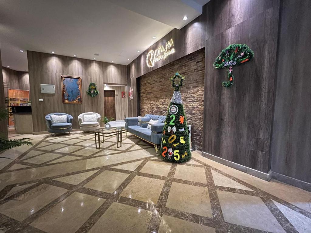 Posezení v ubytování Rotana Palace Suites
