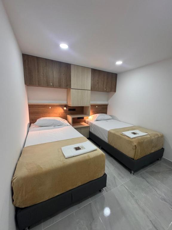 Postel nebo postele na pokoji v ubytování Vida Hostel