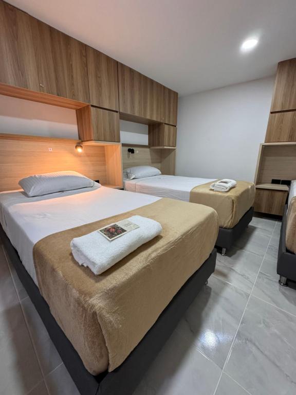 Postel nebo postele na pokoji v ubytování Vida Hostel