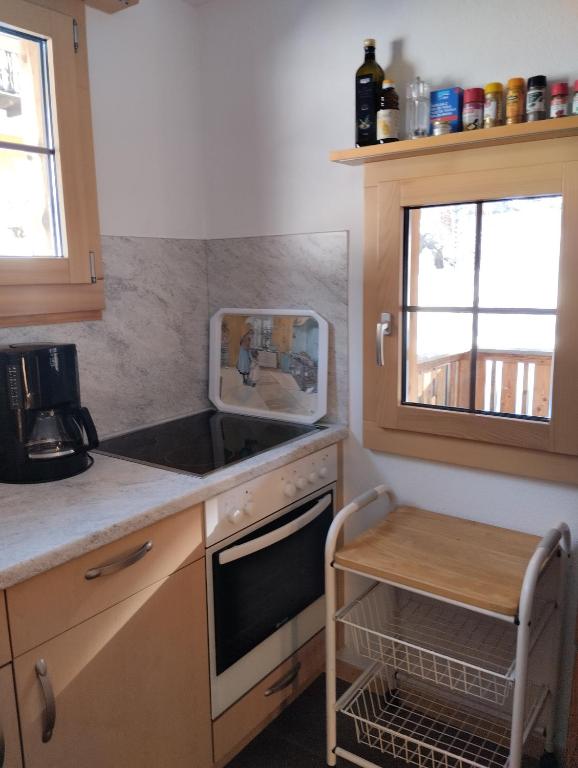 Kuchyň nebo kuchyňský kout v ubytování Chalet Gärlich
