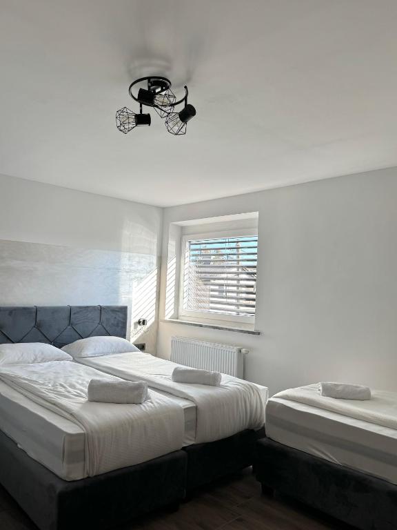 Postel nebo postele na pokoji v ubytování L&L rooms