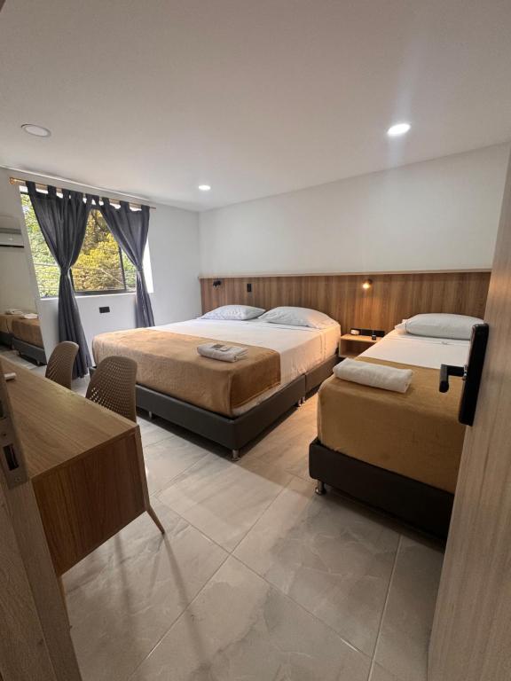 Postel nebo postele na pokoji v ubytování Vida Hostel