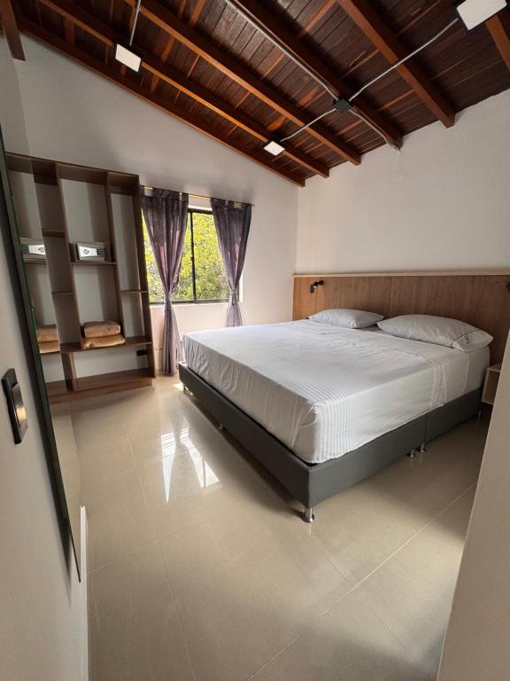 Postel nebo postele na pokoji v ubytování Vida Hostel