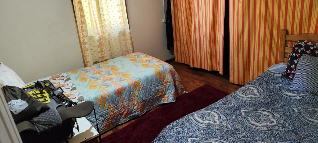 Postel nebo postele na pokoji v ubytování La Casa de Sandrita