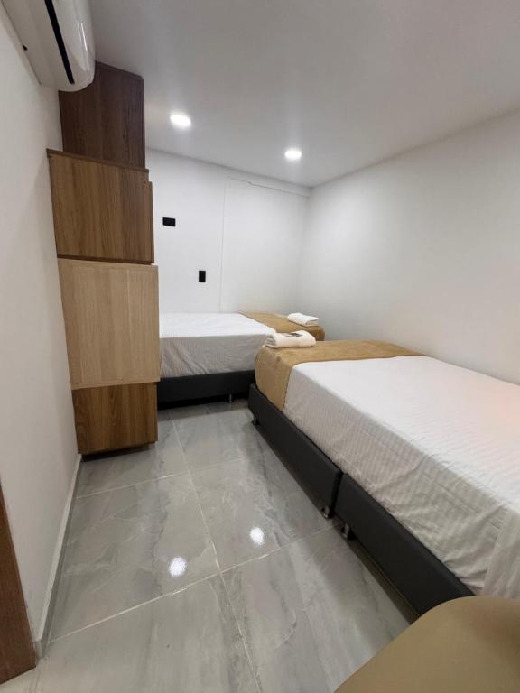 Postel nebo postele na pokoji v ubytování Vida Hostel