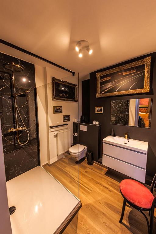 Postel nebo postele na pokoji v ubytování Hôtel Palmarès
