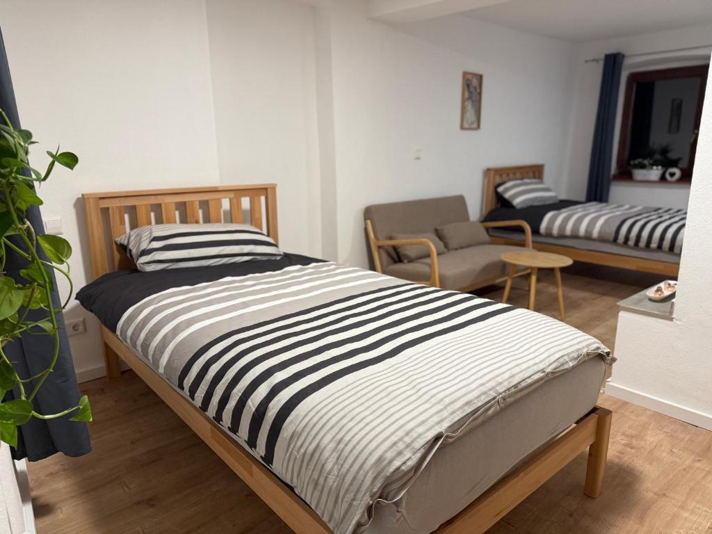 Postel nebo postele na pokoji v ubytování Ferienwohnung Neroth
