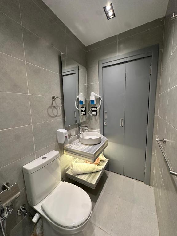 Koupelna v ubytování Elite Hotel